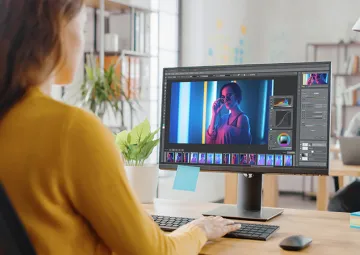 A person editing an image on a computer.