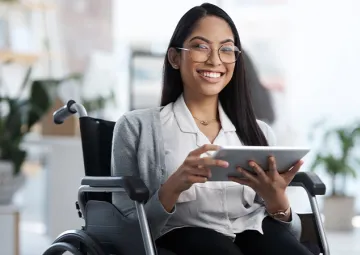 A woman using a tablet computer.