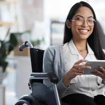 A woman using a tablet computer.